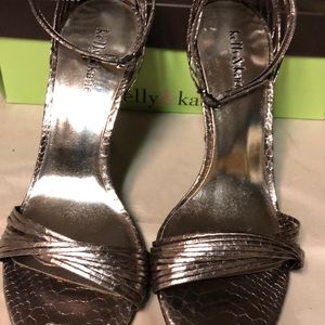 Silver heels  toes out new never worn